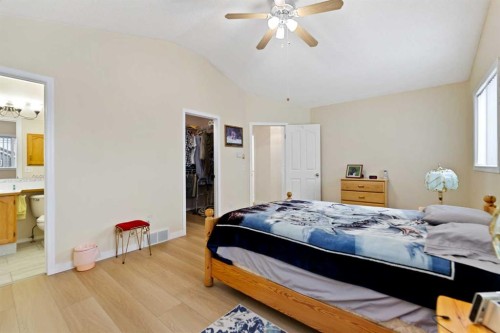 158 Somerglen Road Sw, Calgary, AB - Indoor Photo Showing Bedroom