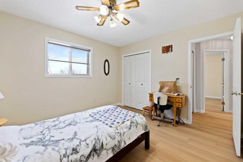158 Somerglen Road Sw, Calgary, AB - Indoor Photo Showing Bedroom
