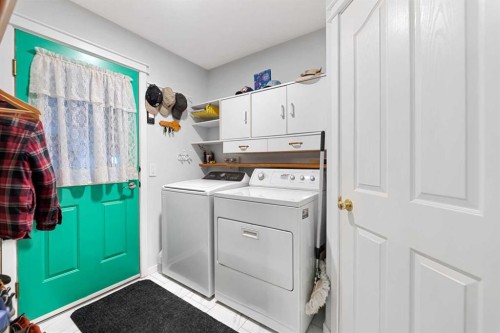 158 Somerglen Road Sw, Calgary, AB - Indoor Photo Showing Laundry Room