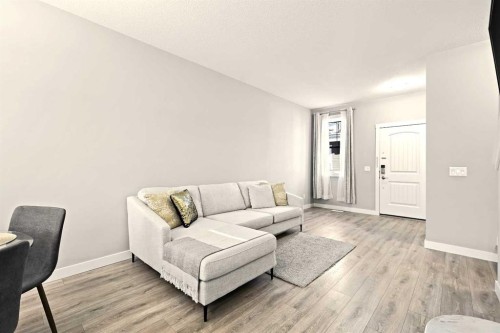410 Cranbrook Walk Se, Calgary, AB - Indoor Photo Showing Living Room