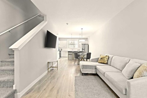410 Cranbrook Walk Se, Calgary, AB - Indoor Photo Showing Living Room