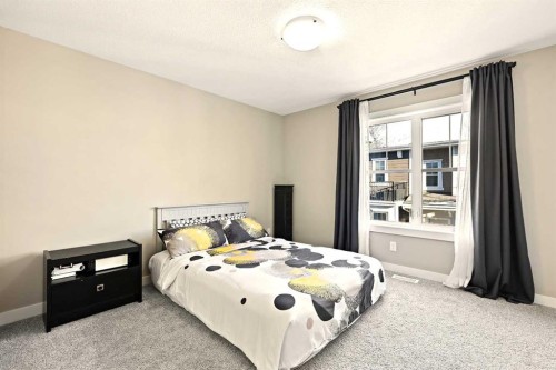 410 Cranbrook Walk Se, Calgary, AB - Indoor Photo Showing Bedroom