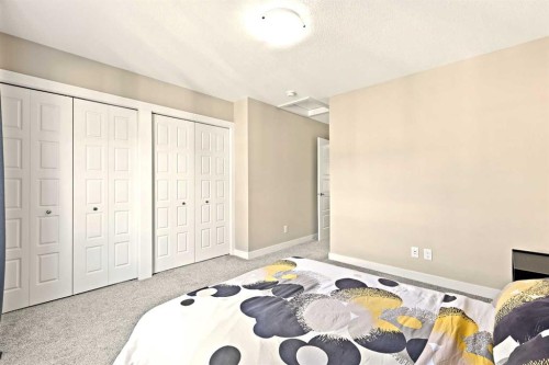 410 Cranbrook Walk Se, Calgary, AB - Indoor Photo Showing Bedroom