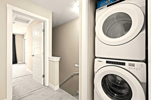 410 Cranbrook Walk Se, Calgary, AB - Indoor Photo Showing Laundry Room