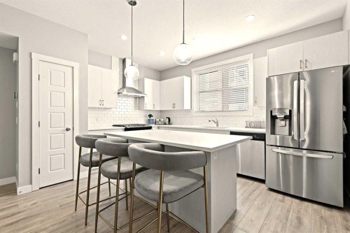 410 Cranbrook Walk Se, Calgary, AB - Indoor Photo Showing Kitchen With Stainless Steel Kitchen With Upgraded Kitchen