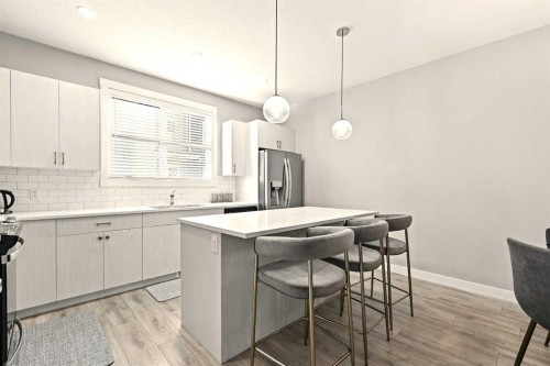 410 Cranbrook Walk Se, Calgary, AB - Indoor Photo Showing Kitchen With Upgraded Kitchen