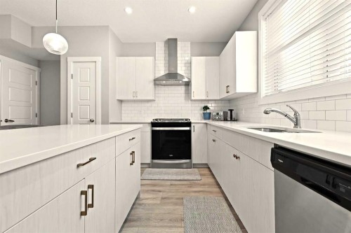 410 Cranbrook Walk Se, Calgary, AB - Indoor Photo Showing Kitchen