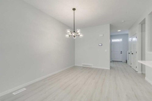 186 Creekside Manor Sw, Calgary, AB - Indoor Photo Showing Other Room
