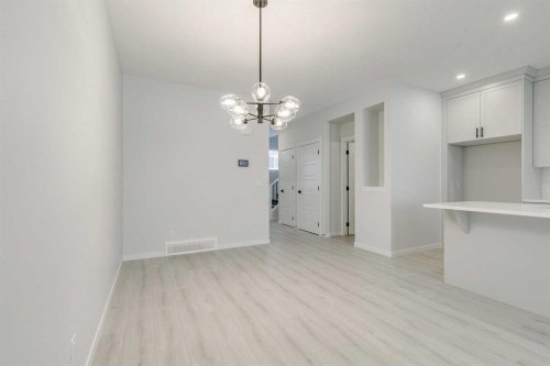 186 Creekside Manor Sw, Calgary, AB - Indoor Photo Showing Other Room