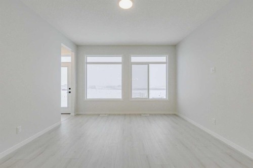 186 Creekside Manor Sw, Calgary, AB - Indoor Photo Showing Other Room
