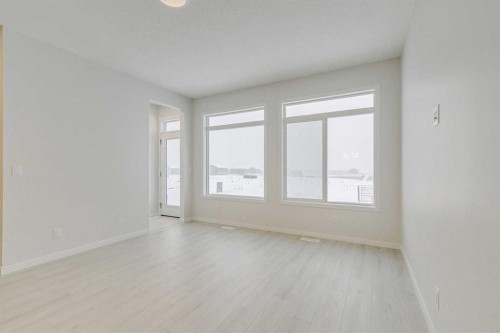 186 Creekside Manor Sw, Calgary, AB - Indoor Photo Showing Other Room