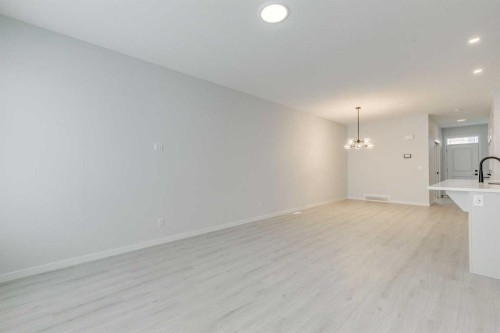 186 Creekside Manor Sw, Calgary, AB - Indoor Photo Showing Other Room