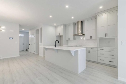 186 Creekside Manor Sw, Calgary, AB - Indoor Photo Showing Kitchen With Upgraded Kitchen