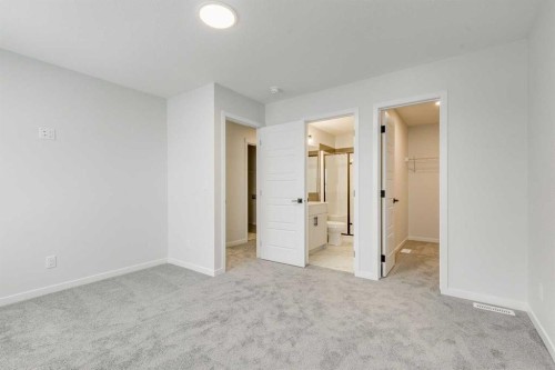 186 Creekside Manor Sw, Calgary, AB - Indoor Photo Showing Other Room