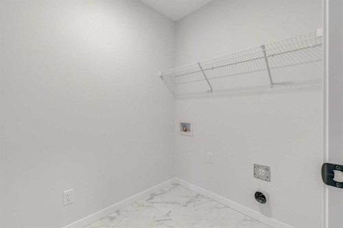 186 Creekside Manor Sw, Calgary, AB - Indoor With Storage