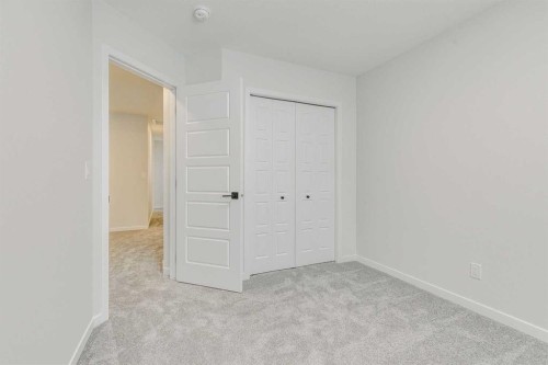 186 Creekside Manor Sw, Calgary, AB - Indoor Photo Showing Other Room