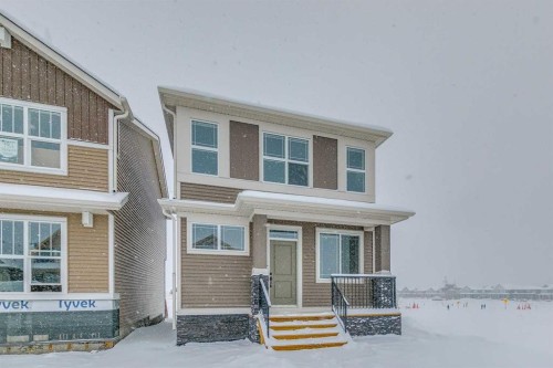 186 Creekside Manor Sw, Calgary, AB - Outdoor With Facade