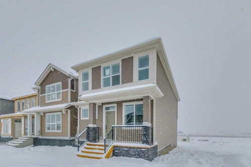 186 Creekside Manor Sw, Calgary, AB - Outdoor With Facade