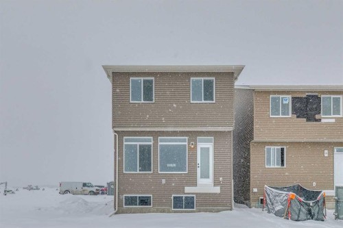 186 Creekside Manor Sw, Calgary, AB - Outdoor