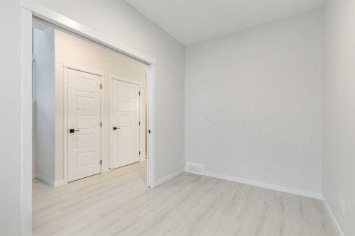 186 Creekside Manor Sw, Calgary, AB - Indoor Photo Showing Other Room