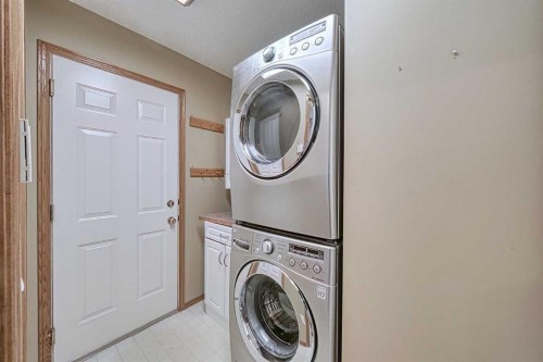 54 Eagleview Way, Cochrane, AB - Indoor Photo Showing Laundry Room