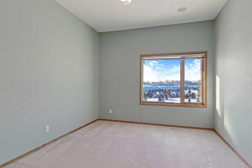 54 Eagleview Way, Cochrane, AB - Indoor Photo Showing Other Room