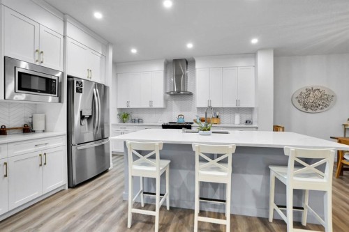 40 Belmont Heath Sw, Calgary, AB - Indoor Photo Showing Kitchen With Upgraded Kitchen