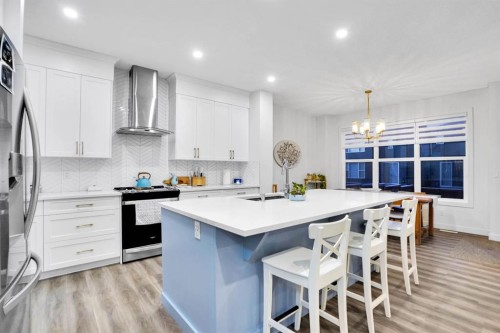 40 Belmont Heath Sw, Calgary, AB - Indoor Photo Showing Kitchen With Upgraded Kitchen