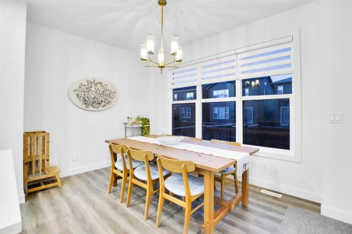 40 Belmont Heath Sw, Calgary, AB - Indoor Photo Showing Dining Room