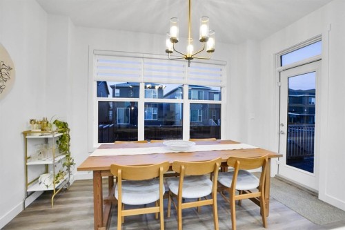 40 Belmont Heath Sw, Calgary, AB - Indoor Photo Showing Dining Room