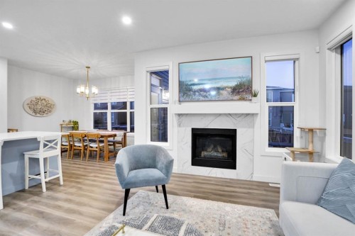 40 Belmont Heath Sw, Calgary, AB - Indoor Photo Showing Living Room With Fireplace