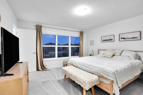 40 Belmont Heath Sw, Calgary, AB - Indoor Photo Showing Bedroom