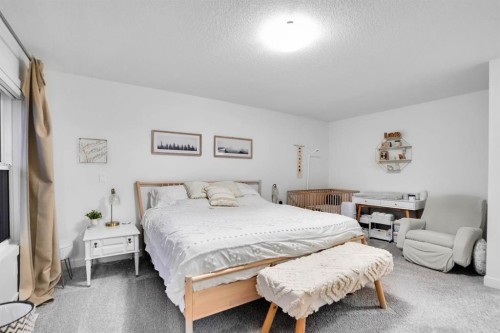 40 Belmont Heath Sw, Calgary, AB - Indoor Photo Showing Bedroom