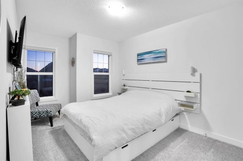 40 Belmont Heath Sw, Calgary, AB - Indoor Photo Showing Bedroom