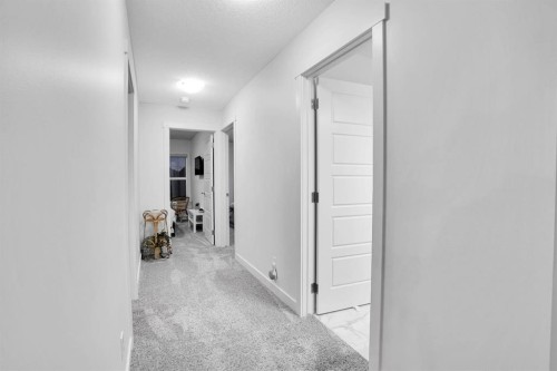 40 Belmont Heath Sw, Calgary, AB - Indoor Photo Showing Other Room