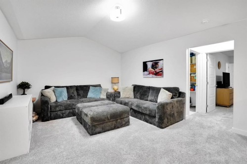 40 Belmont Heath Sw, Calgary, AB - Indoor Photo Showing Living Room