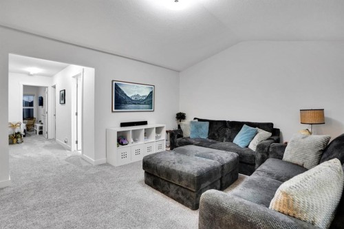 40 Belmont Heath Sw, Calgary, AB - Indoor Photo Showing Living Room