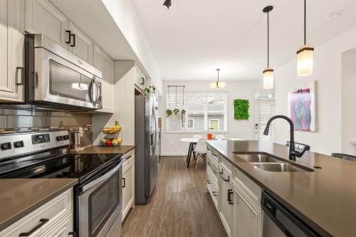 137 Mahogany Drive Se, Calgary, AB - Indoor Photo Showing Kitchen With Double Sink With Upgraded Kitchen