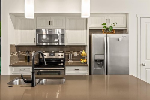137 Mahogany Drive Se, Calgary, AB - Indoor Photo Showing Kitchen With Double Sink With Upgraded Kitchen