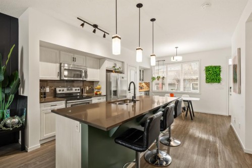 137 Mahogany Drive Se, Calgary, AB - Indoor Photo Showing Kitchen With Double Sink With Upgraded Kitchen