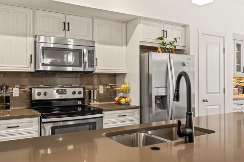 137 Mahogany Drive Se, Calgary, AB - Indoor Photo Showing Kitchen With Double Sink With Upgraded Kitchen