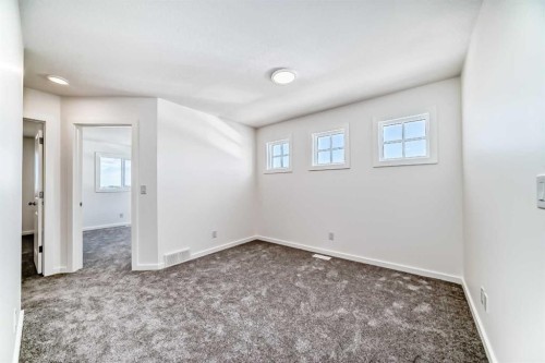 270 Sora Way Se, Calgary, AB - Indoor Photo Showing Other Room