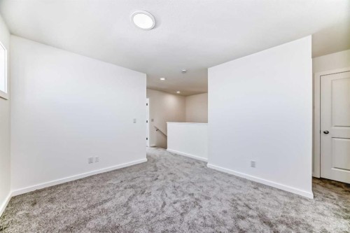 270 Sora Way Se, Calgary, AB - Indoor Photo Showing Other Room