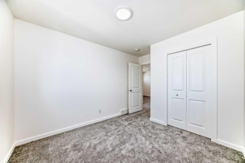 270 Sora Way Se, Calgary, AB - Indoor Photo Showing Other Room