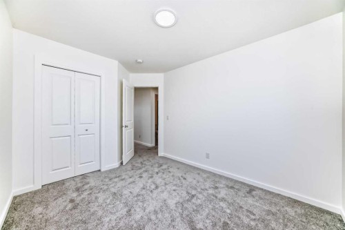 270 Sora Way Se, Calgary, AB - Indoor Photo Showing Other Room