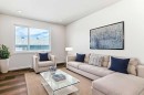 270 Sora Way Se, Calgary, AB  - Indoor Photo Showing Living Room 