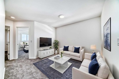 270 Sora Way Se, Calgary, AB - Indoor Photo Showing Living Room