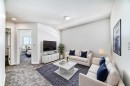 270 Sora Way Se, Calgary, AB  - Indoor Photo Showing Living Room 