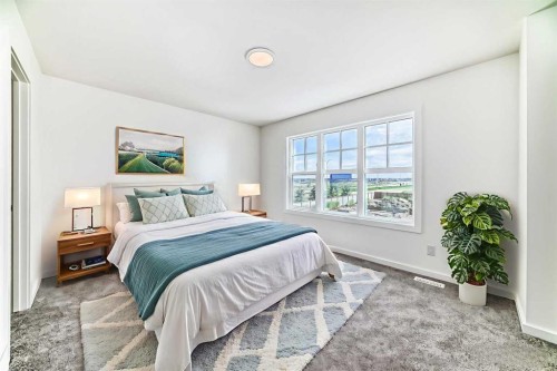 270 Sora Way Se, Calgary, AB - Indoor Photo Showing Bedroom