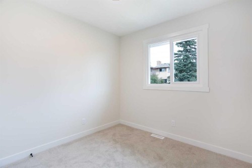 24 Hawkwood Crescent Nw, Calgary, AB - Indoor Photo Showing Other Room